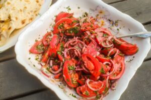 Tomato salad «under barbecue»