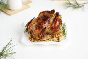 Chicken cornishon in the oven on the festive table