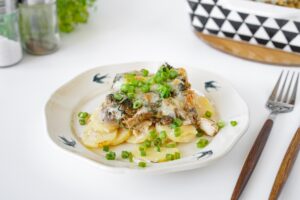 Casserole with chicken, potatoes and mushrooms