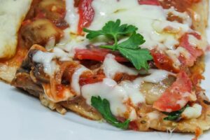 Pizza on the finished puff pastry