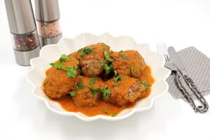 Cutlets with gravy gravy in a pan