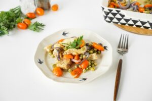 Plow with vegetables in the oven