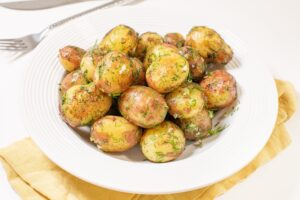 Young potato with dill for a pan