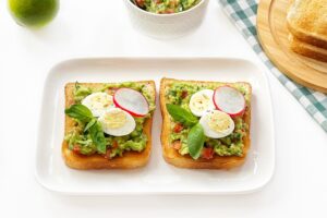 Avocado toast and tomatoes for breakfast