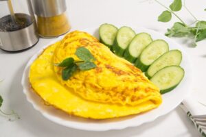 Frush omelet recipe in a frying pan with milk