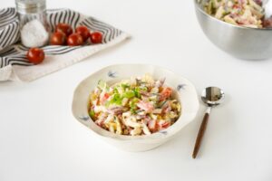 Peking cabbage and sausage salad