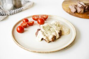 Beef steak in creamy sauce