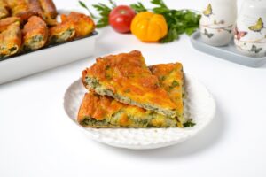 Cake with greens and cheese in the oven