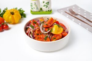 Pickled salad of tomatoes with onions