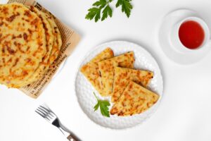 Kefira with cheese in a pan