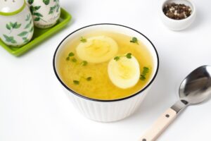 Chicken broth with vermicelli and egg