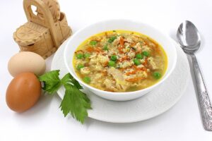Curly soup with egg and chicken