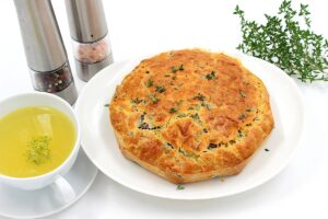 Mushroom pie and cheese in the oven