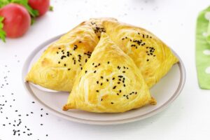 Uzbek-style samsa with pumpkin in the oven