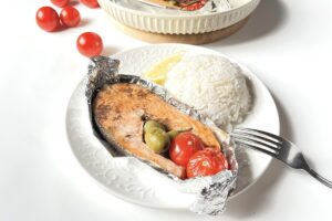 Trout steak in foil in the oven