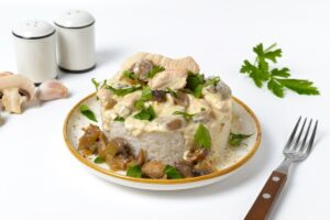 Indian in sour cream sauce with mushrooms