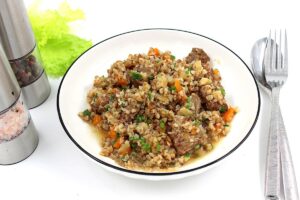 Buckwheat with meat in a frying pan