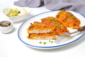 Chicken chops under a fur coat in the oven
