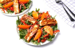 Salad with fried cheese and tomatoes