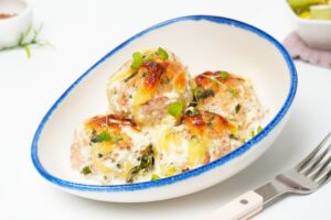 Fish meatballs in cream sauce
