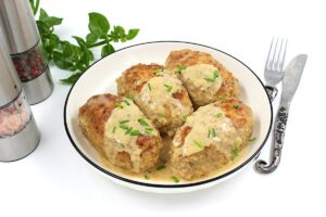 Meat zrazy with mushrooms in a frying pan