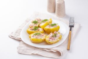 Stuffed potatoes in the oven with ham