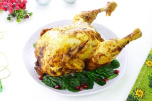 Chicken on a bottle in the oven for the New Year