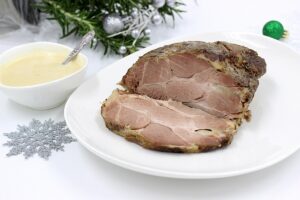 Pork with garlic in foil for the New Year