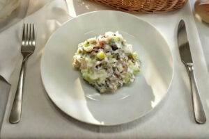 Salad with herring, cucumber and apple